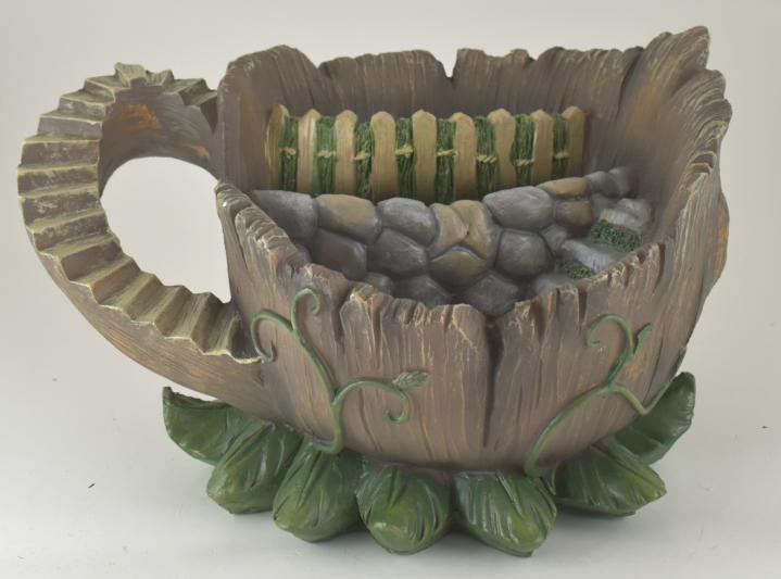 12" Resin Tea Cup Container Decor image