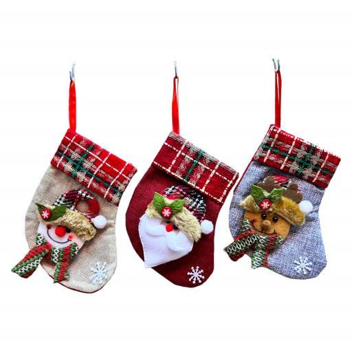 Christmas Stocking. Asst. Santa Reindeer Snowflake Red White Brown Silver Black image