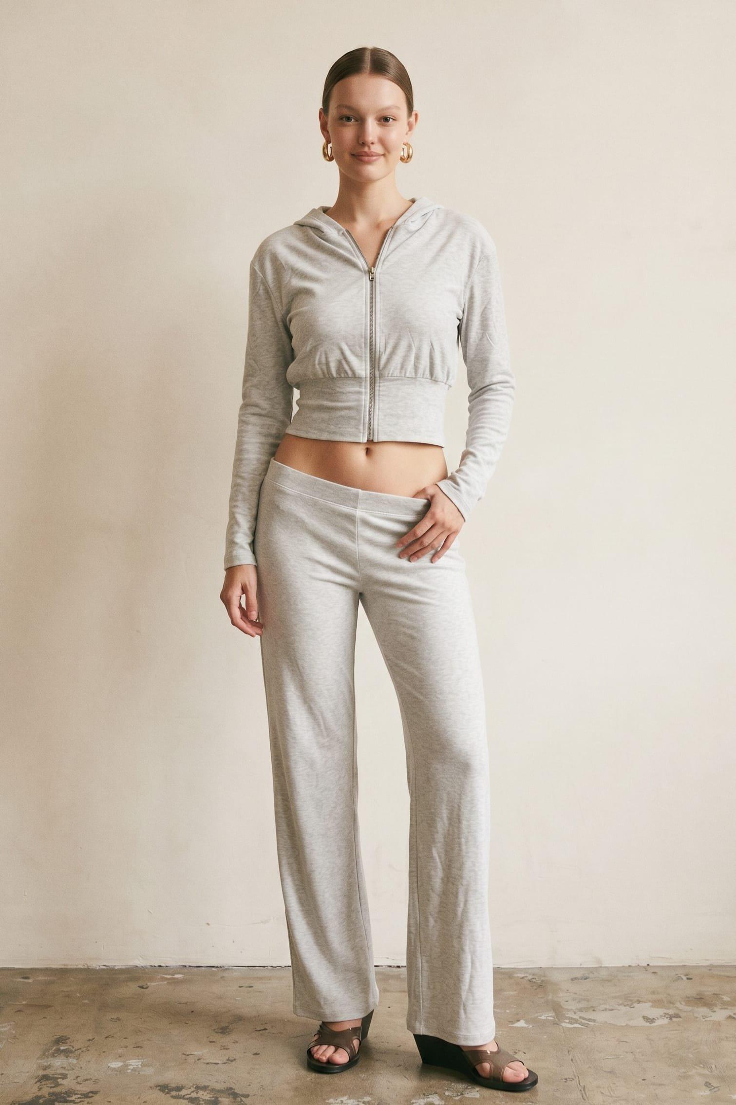 A Ribbed Knit Two-Piece Set Featuring A Cropped Zip-Front Hoodie Paired With Mat (Ribbed) image