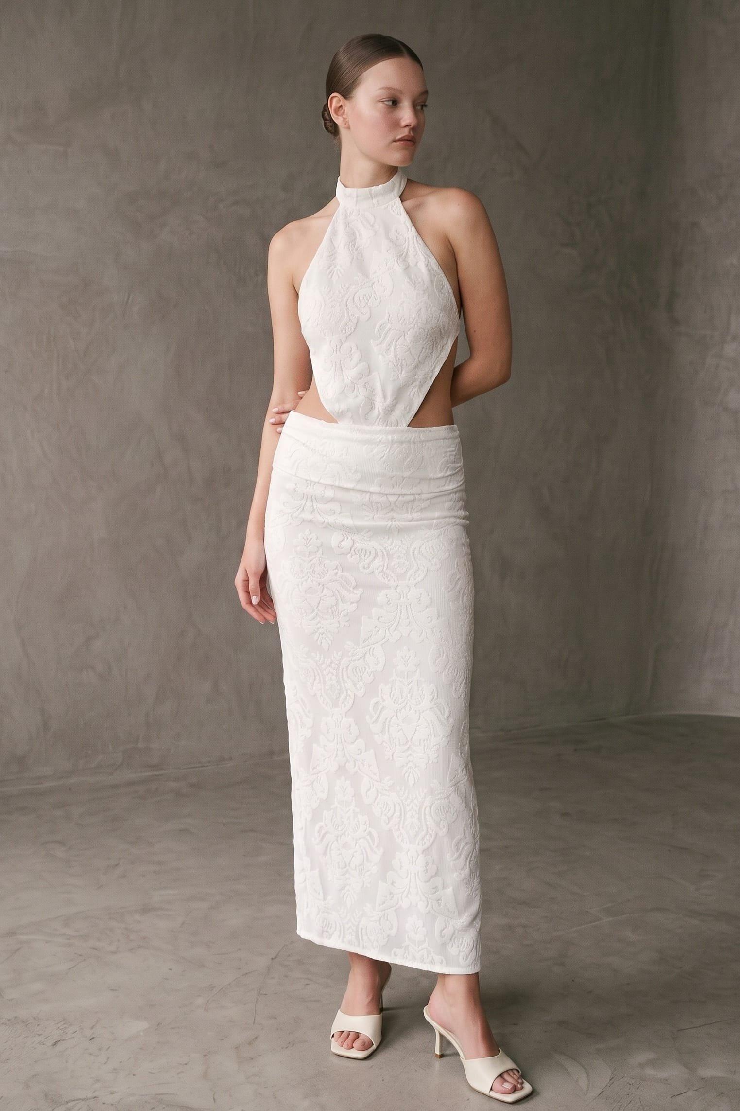 A Bold And Striking Maxi Dress Featuring A High Halter Neckline With An Open Bac (High) image