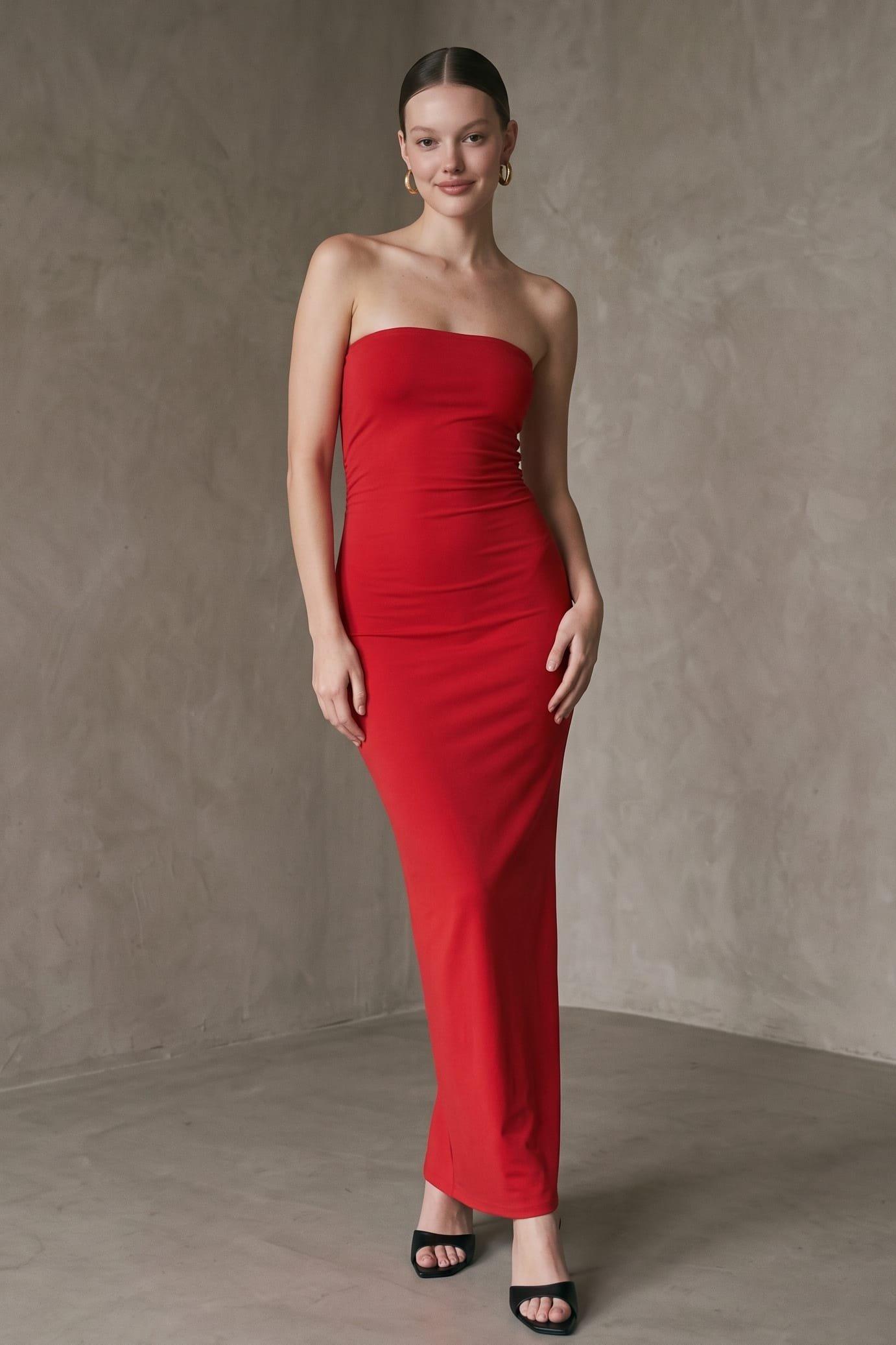 A Sleek Strapless Bodycon Maxi Dress Featuring A Fitted Straight Neckline And A (Strapless) image