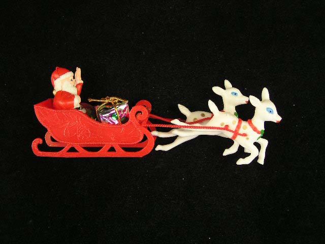 Plastic Red Sleigh with Santa and 2 White Reindeer 8.25 Inch (lot of 24) Clearance image
