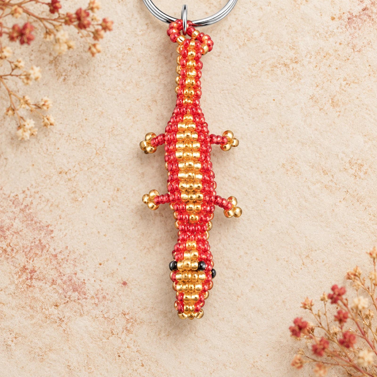Red and Gold beaded gecko keychain image