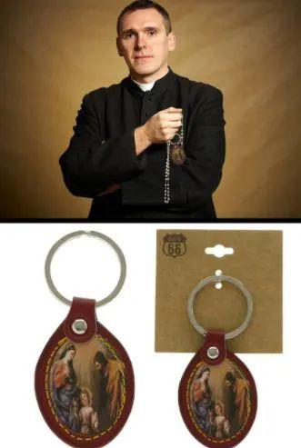 96 Wholesale 96 Faux Leather Keychain With An Oval Shaped Picture Of Mary Joseph And Baby Jesus image