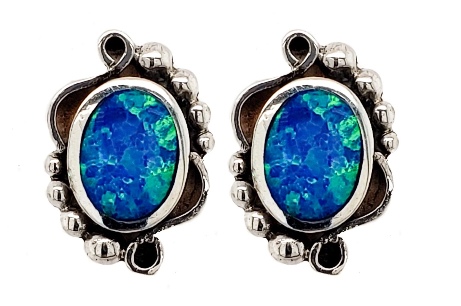Sterling Silver Created Blue / White Opal Oval Stud Earrings (SOE455) image