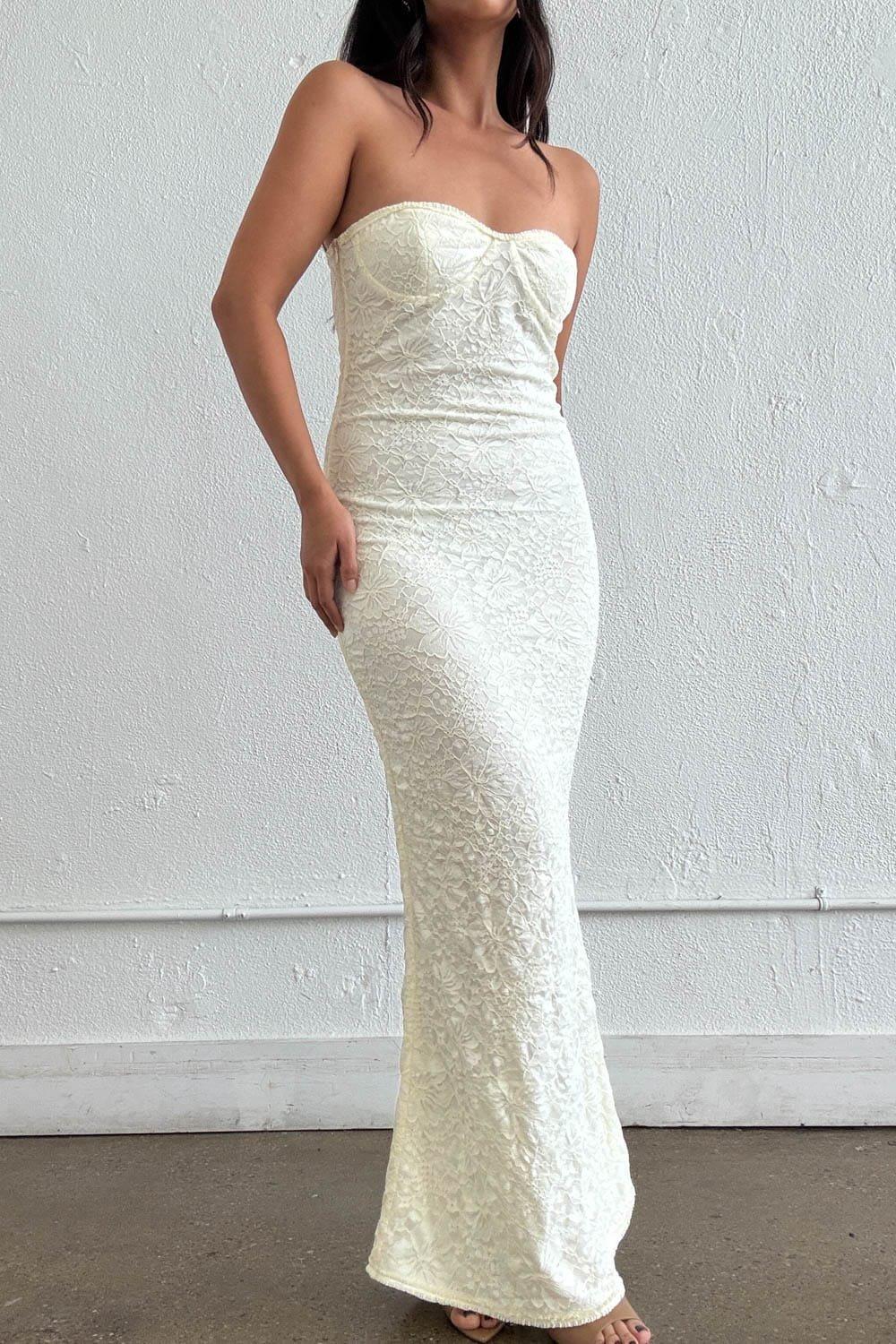 An Exquisite And Figure-Hugging Strapless Maxi Dress Crafted From A Delicate, Textured Floral Lace. Featuring A Flattering Sweetheart Neckline With Supportive Structured Cups. The Premium Stretch Lace Fabric Contours The Body While Ensuring Effortless Movement, Flowing Into An Elegant, Floor-Length Silhouette. A Romantic And Sophisticated Piece, It Is Perfect For Formal Events, Evening Occasions, Or A Refined Bridal Look. – Strapless Sweetheart Neckline With Structured Cups For A Secure, Supportive Fit – Delicate And Detailed Floral Lace Overlay For A Classic, Romantic Aesthetic – Contouring Bodycon Fit That Sculpts And Defines The Figure Comfortably – Full Opaque Lining For A Smooth, High-Quality, And Secure Wear Fabric Content: (S7948D) image