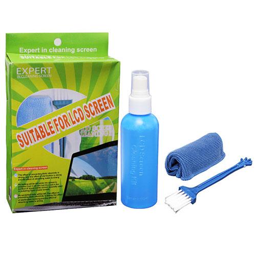 A Bottle of Cleaning Solution, a Cloth, and a Soft Brush image