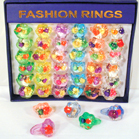 FLOWER FILLED LUCITE RINGS -* CLOSEOUT NOW ONLY 25 CENTS EA